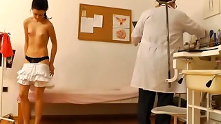 Slim brunette having her pussy stretched